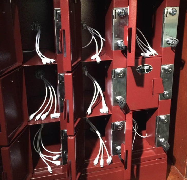 A local bar has an area where you can rent a locker to store your phone while it charges.