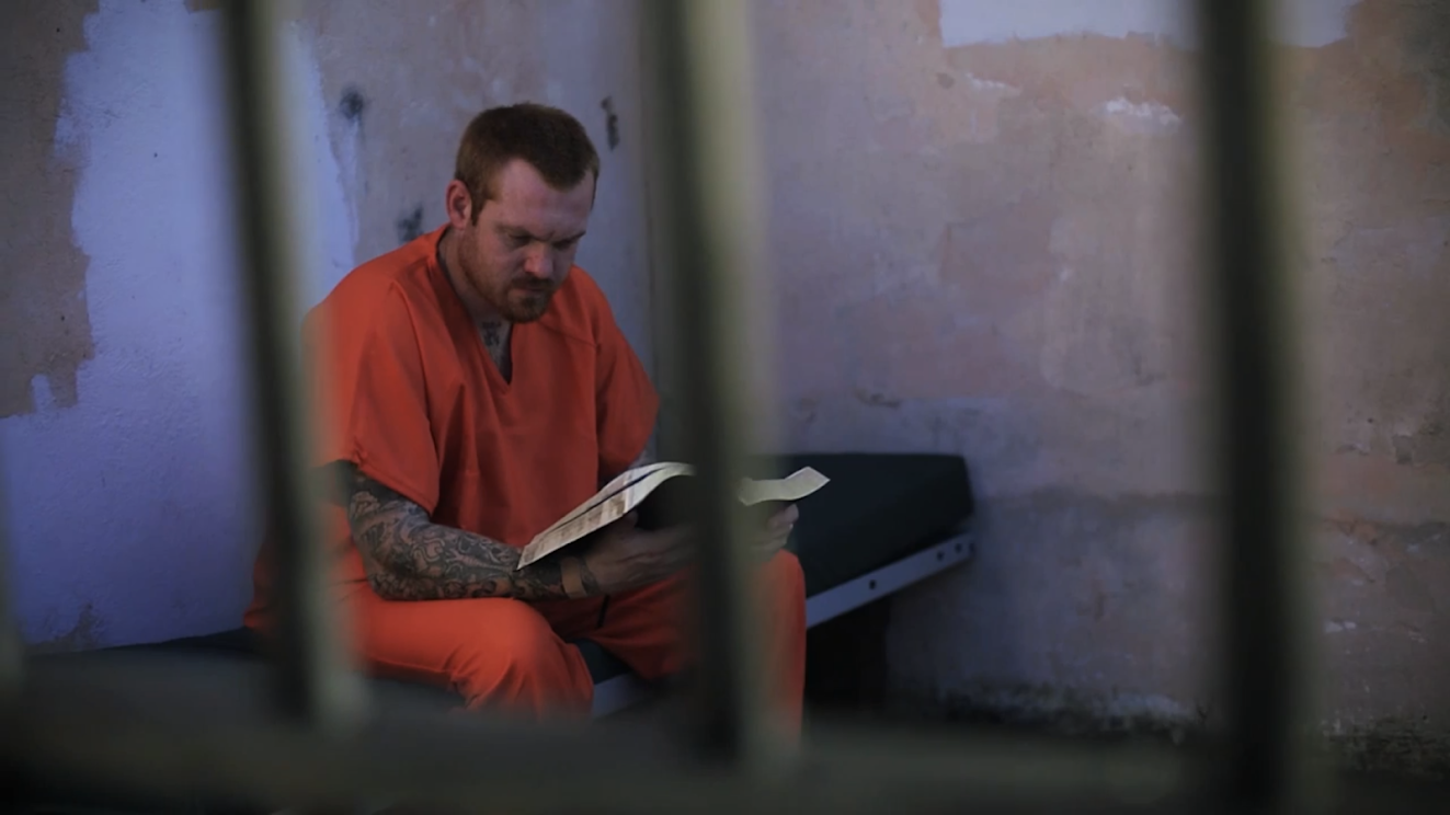 prison tips - how to survive prison - prisoners reading the bible
