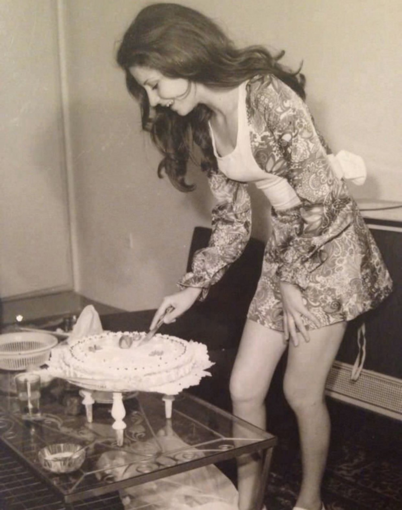 Woman cutting her birthday cake in Iran 1973, 5 years before the Islamic Revolution