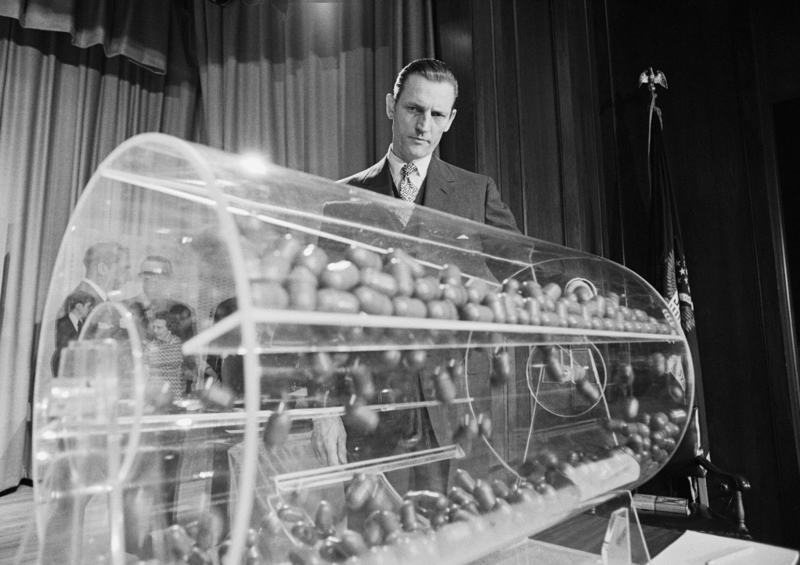 The lottery used by the Selective Service to determine who would be drafted for Vietnam first. In each capsule is a day of the year, determining the order of draftees by their birthday. Washington D.C. 1969