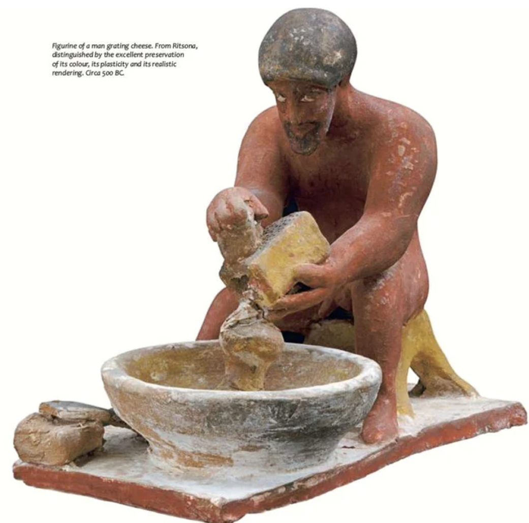 awesome ancient artifcats - male cheese - purine of a man pating cheese Fromon, distinguished by the excellent preservation of its colour, ita pliticity and its realistic rendering, Crea 500