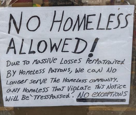 Horrible Management - sign - No Homeless Allowed! Due to Massive Losses Perpatraired By Homeless Patrons, we can No Longer serve The Homeless Carrowity. any Homeless That Violate this Notice Will Be Tresspassed. No exceptions