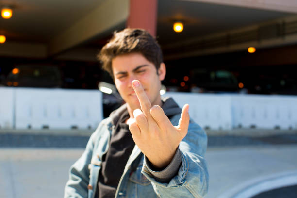 30 Things That Aren't Cool When You're Over 30 - guy flipping off camera