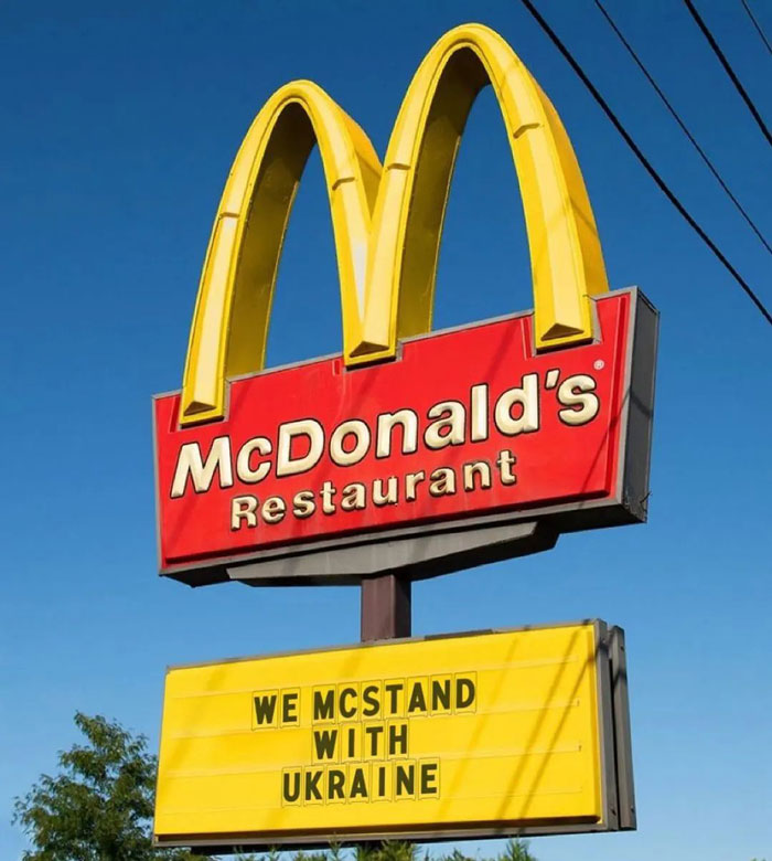Humans of Capitalism - mcdonalds sign - M McDonald's Restaurant We Mcstand With Ukraine