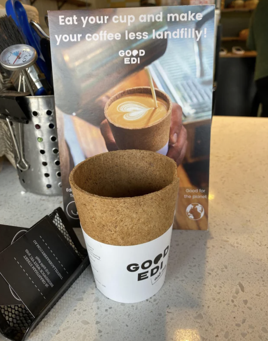 Edible coffee cup made from oats and grains.