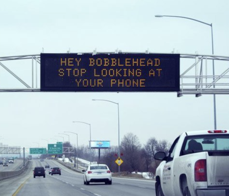 electronic sign hacks - lane - Hey Bobblehead Stop Looking At Your Phone