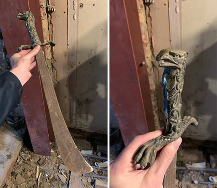 "Found this cool old machete / sword with a carved handle in the attic of my grandpa's house".