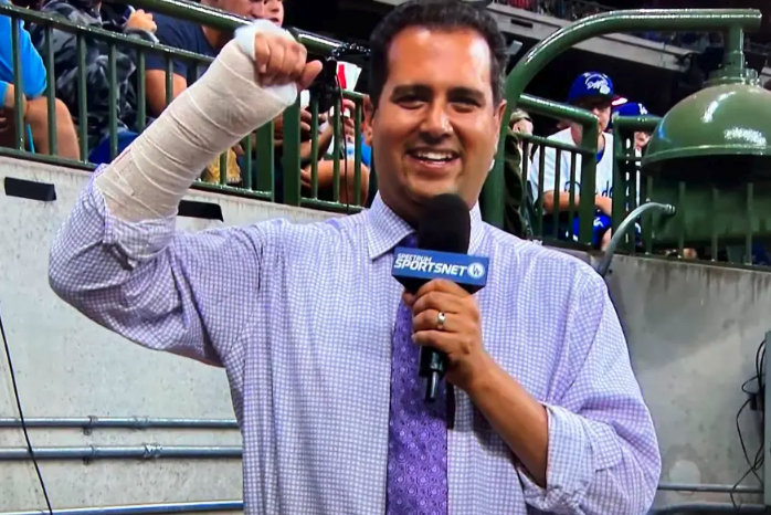 Dodgers reporter fractures wrist going down a slide