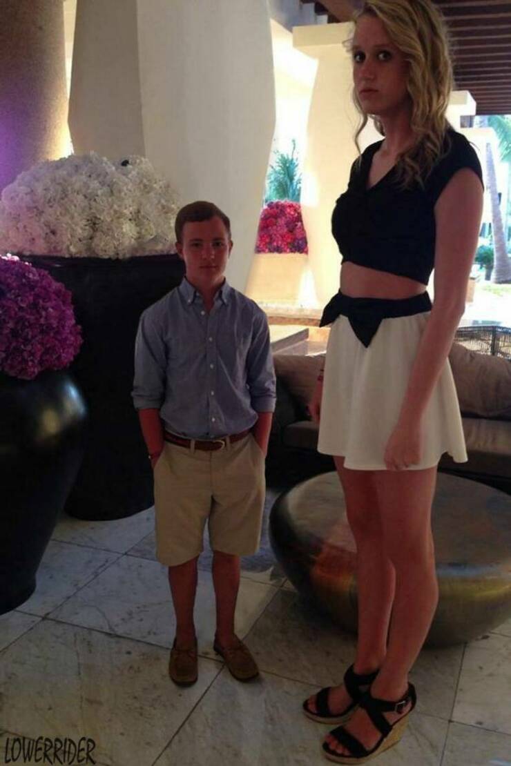 cool random photos - little sister taller than older brother