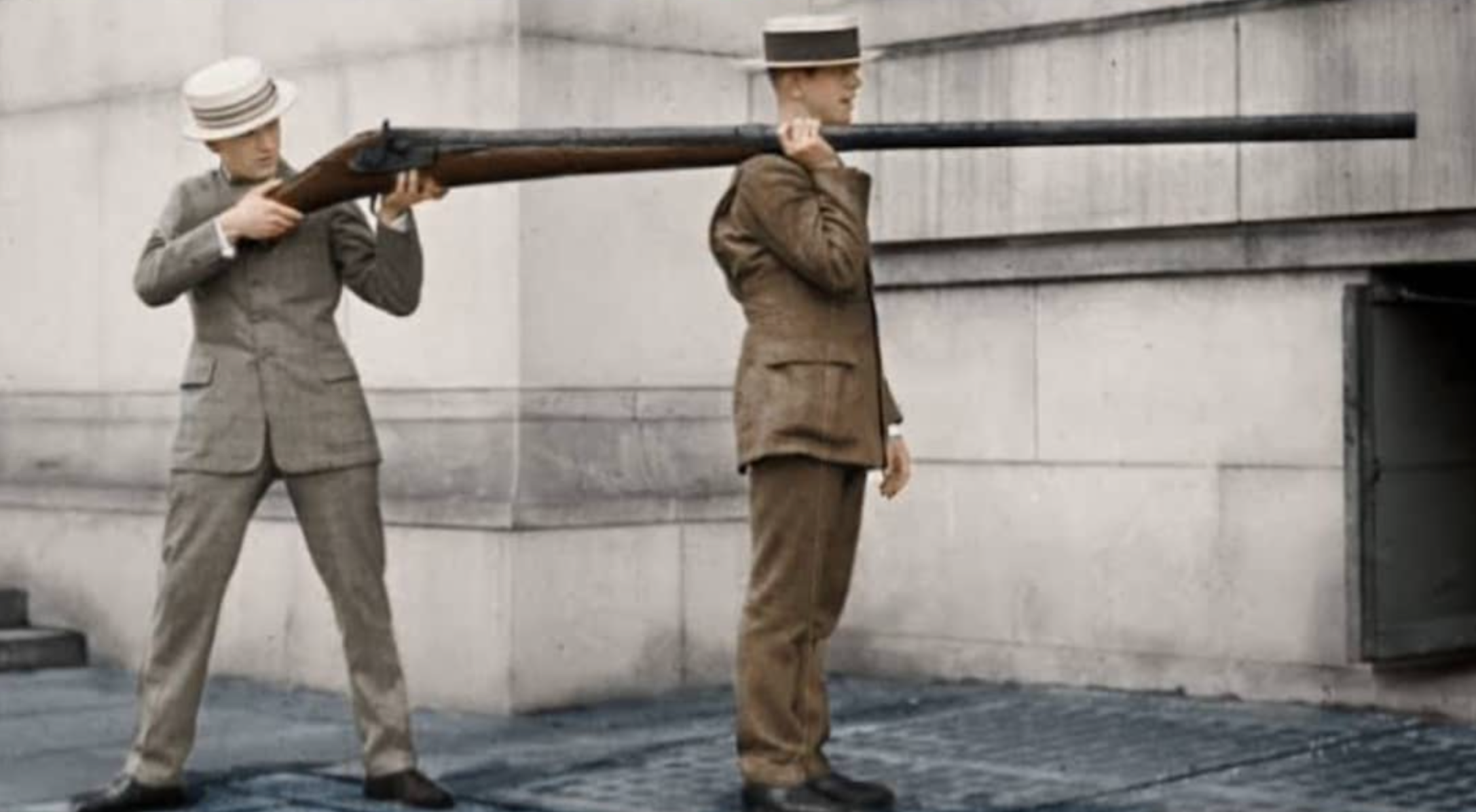 Incredibly interesting guns - Punt gun being held by two men