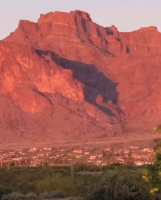 Spectacular Photos  - This enormous cougar-shaped shadow appears only twice each year; One week in March, the other in September -- Superstition Mountains, Apache Junction, AZ