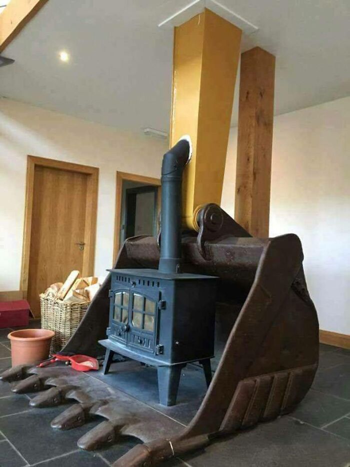 good and bad designs - excavator bucket fireplace - Dif