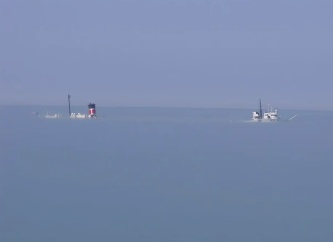 Is this super low fog? Or are these ships just sinking?