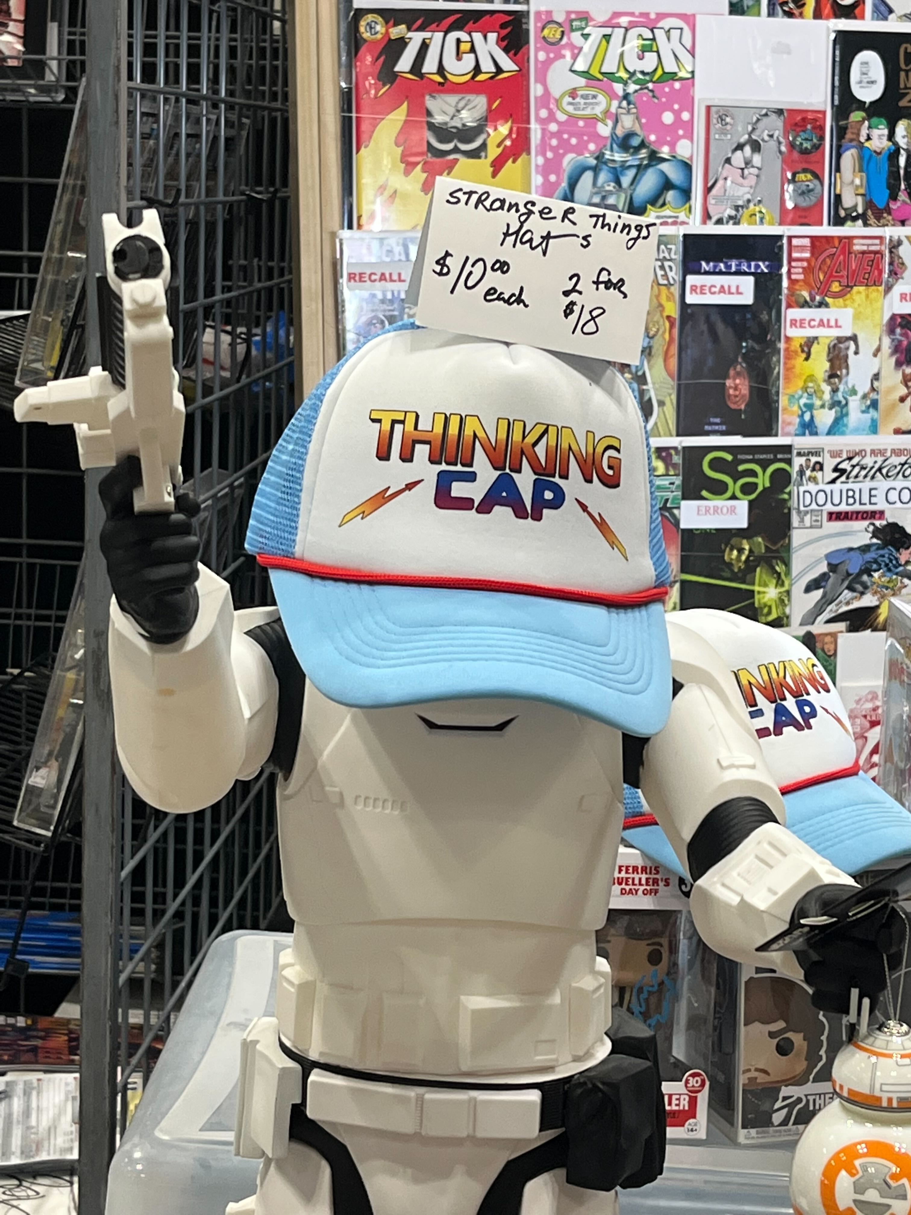 Things you can buy at comic con - costume - Ticktick Recall Stranger Hat Things $10 2 for $18 each Thinking Cap