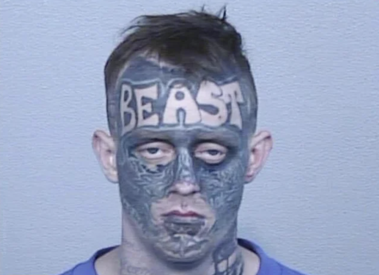 Awful tattoos - beast tattoo face - Beast