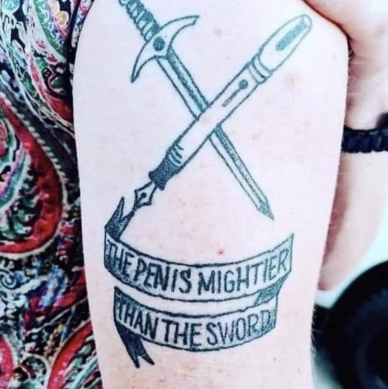 Awful tattoos - penis mightier than the sword -
