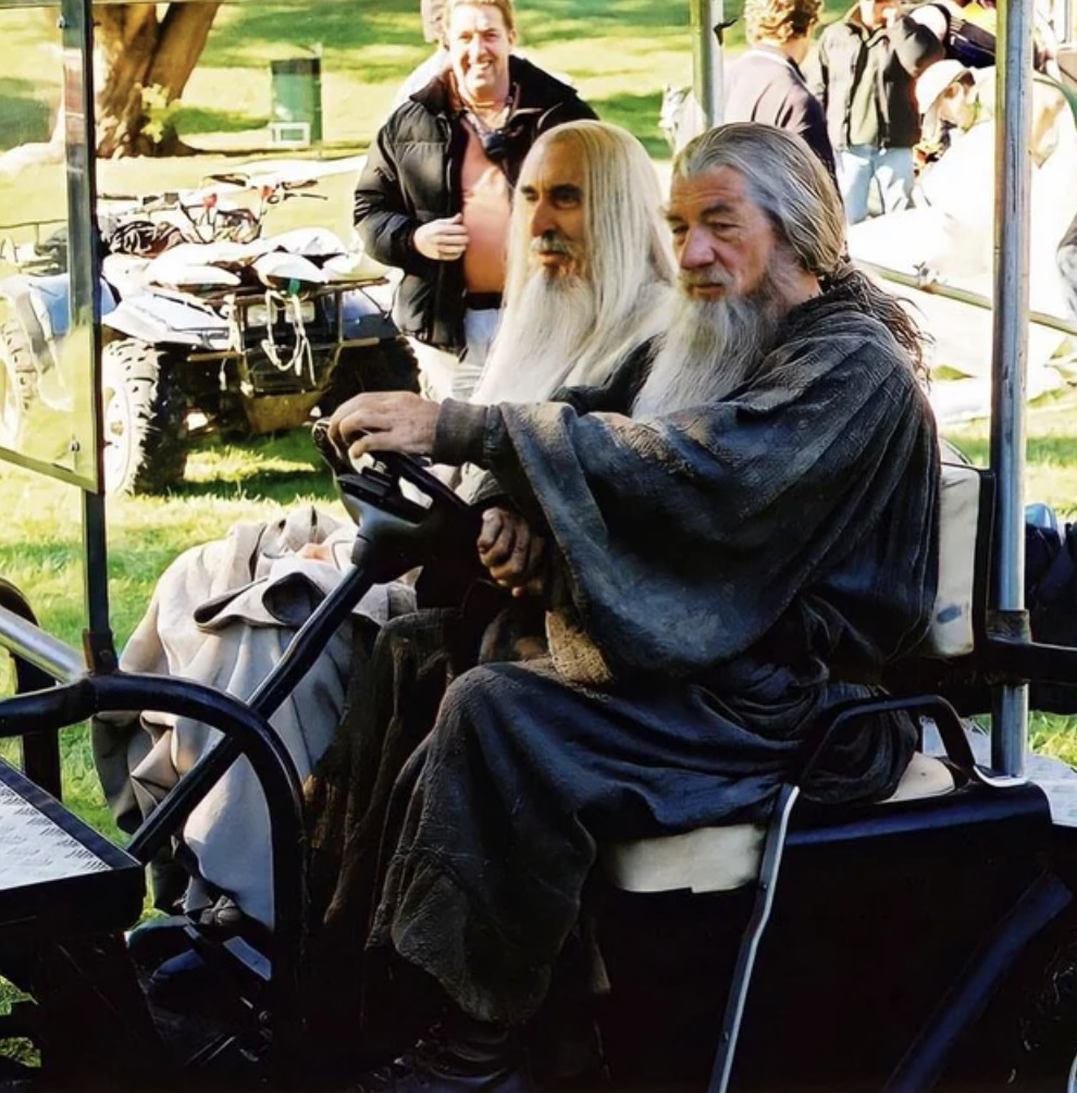 Ian McKellen and Christopher Lee living their best lives on the set of 'Lord of the Rings.'