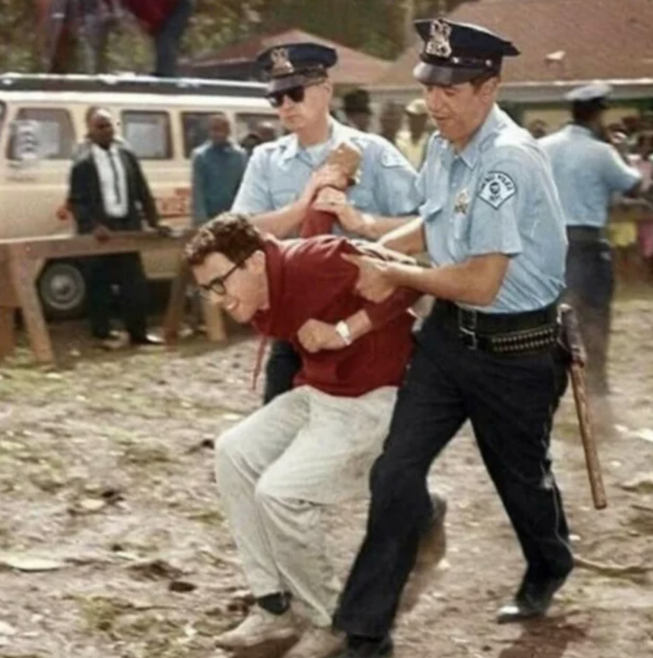 Bernie Sanders being arrested in 1963 at a protest.