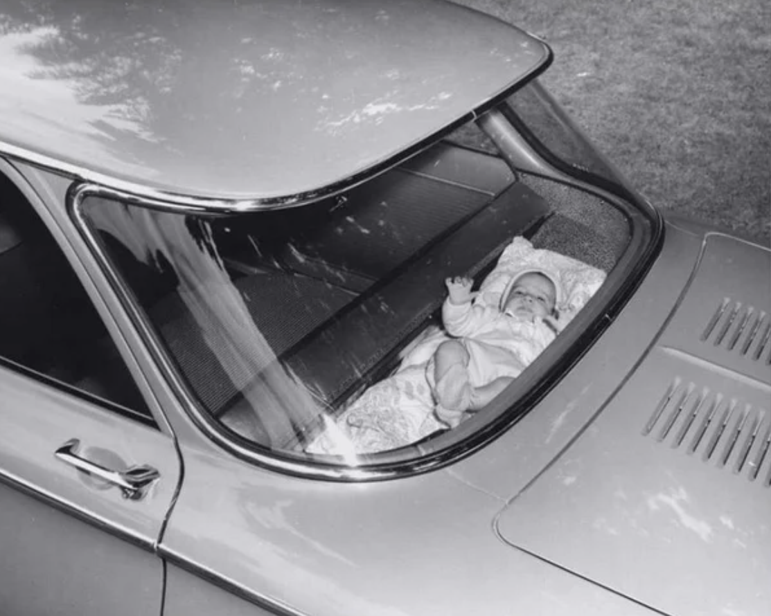 The 1960 Corvair dash baby cradle. Since engines were in the back of the car, it would typically 'rock' the baby to sleep.