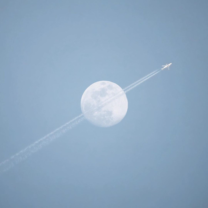 “I was taking photos of the moon and unexpectedly captured this perfect moment.”