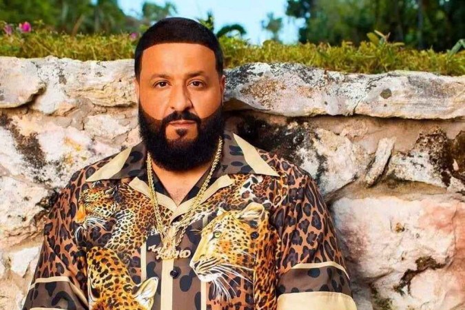 DJ Khaled. He really just adds a few beats after saying his name at the beginning of the song. -catkel