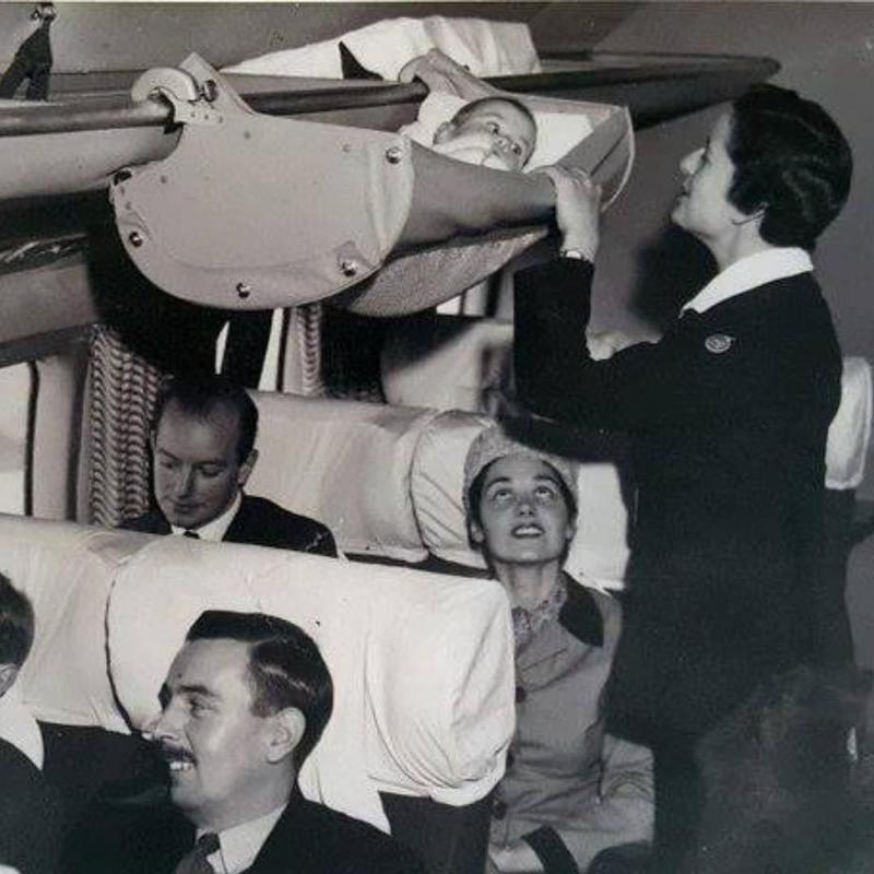 Overhead cradles for babies were a popular feature on planes in the 1950s.