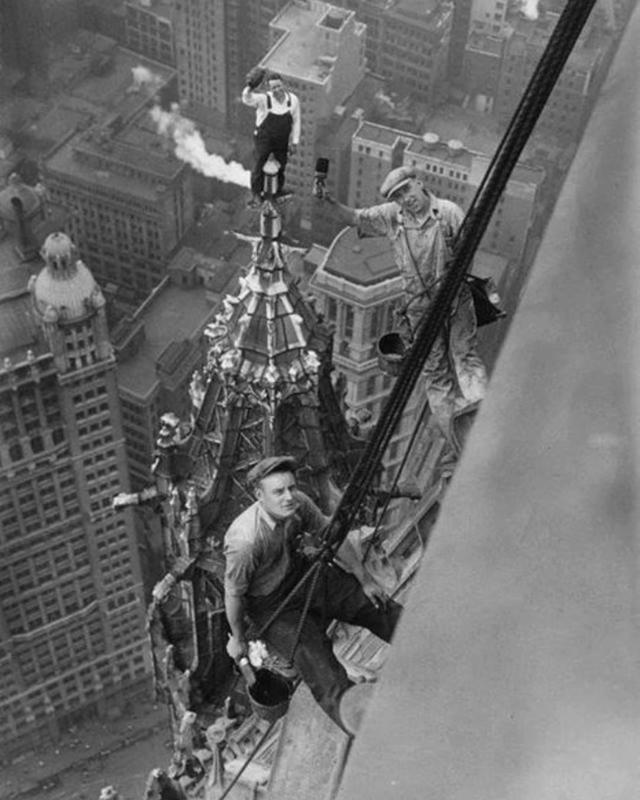 1926, painting the Woolworth Building in New York City.
