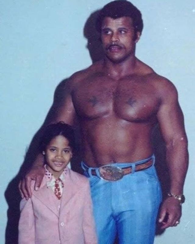Pro wrestler Rocky Johnson with his 7-year-old son, Dwayne Johnson.