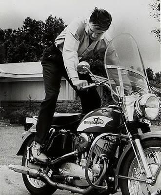 Elvis starting up his Harley.