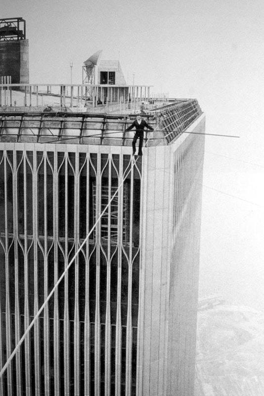 1974, Philippe Petit walks a tight rope between the Twin Towers, NYC.