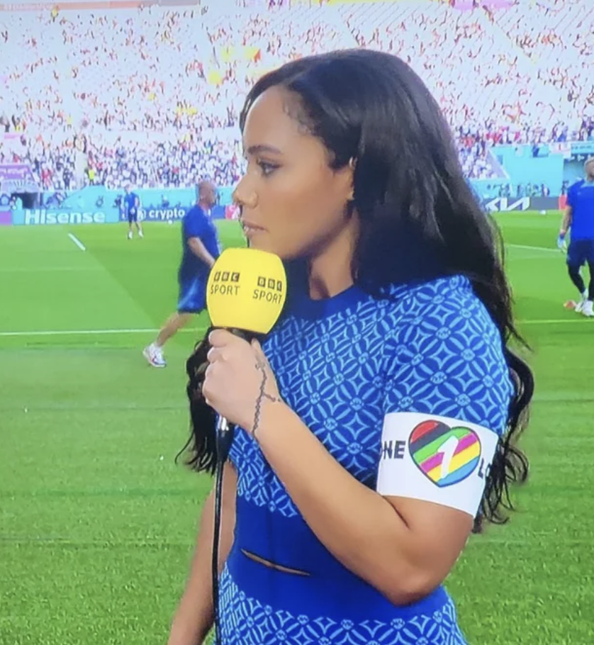 Reporter, Alex Scott wears 'One Love' armband that World Cup players weren't allowed to wear.