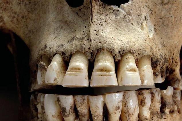 Intriguing and unsettling photos - viking teeth tattoo