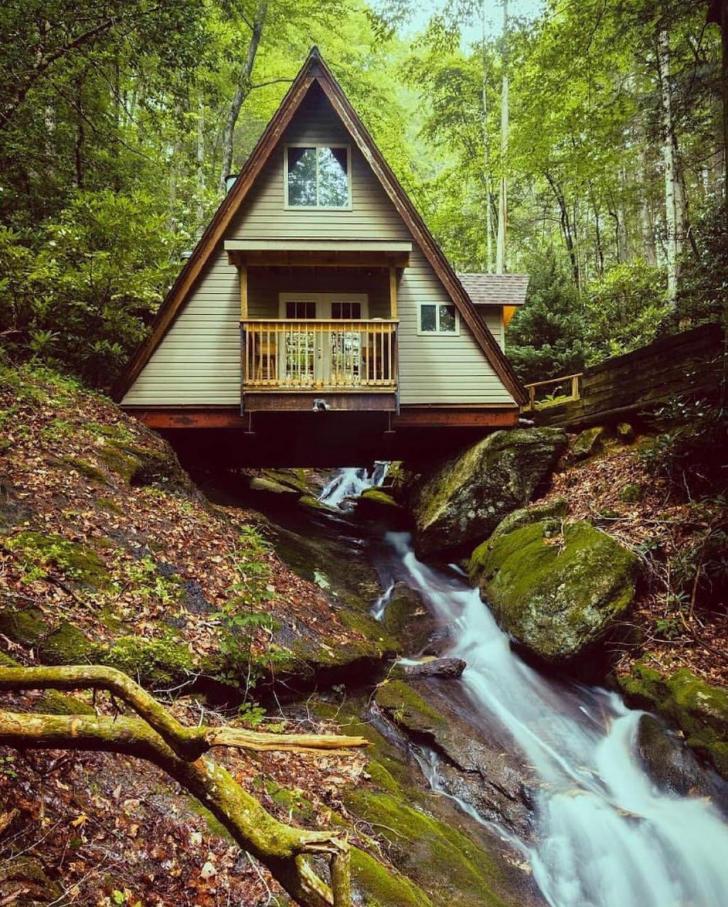 awesome pics and memes - cabin built over creek