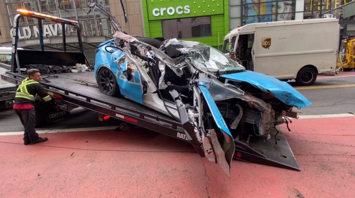 Tesla speeds to 70mph, smashing into a delivery truck and a tour bus. 