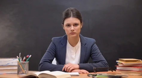 what got teachers fired at your school - teacher looking angry
