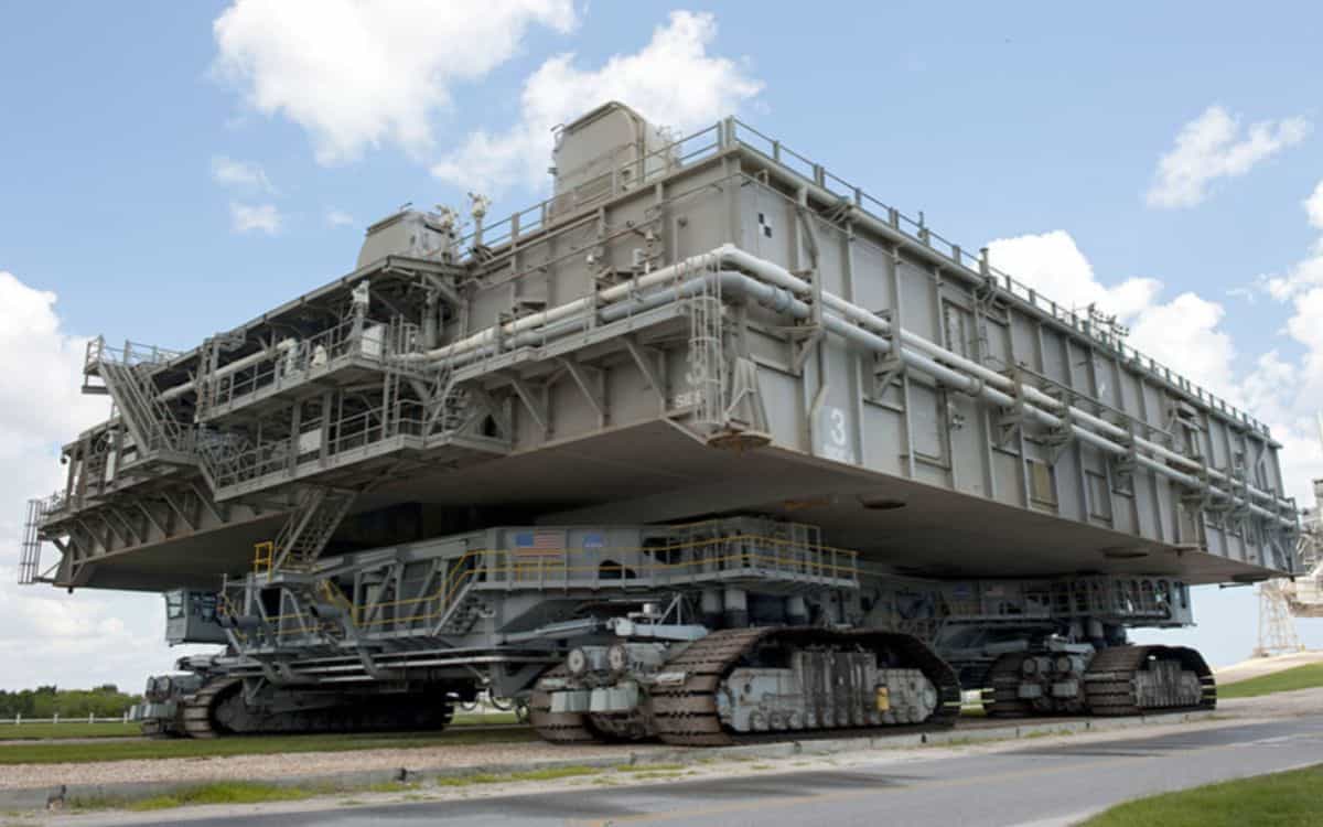 The NASA crawler-transporters carry rockets to their launch sites. 