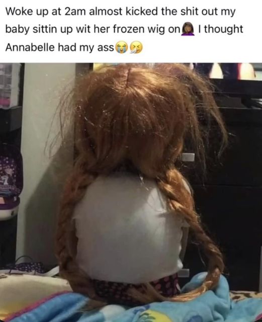 photo caption - Woke up at 2am almost kicked the shit out my baby sittin up wit her frozen wig on I thought Annabelle had my ass