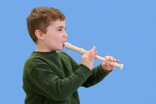 one thing satan gifts you in hell - kid playing recorder stock