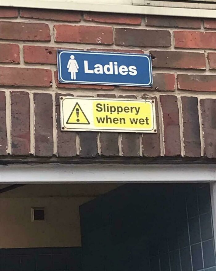 street sign - Co Ladies Slippery when wet