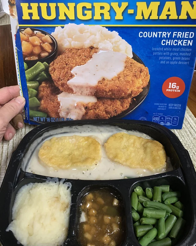 expectations vs reality - meal - HungryMan Net Wt 16 071. Country Fried Chicken hreaded white meat chicken palties with gravy, mashed potatoes, press beans and an appie dessert 490 16 Protein P Tem