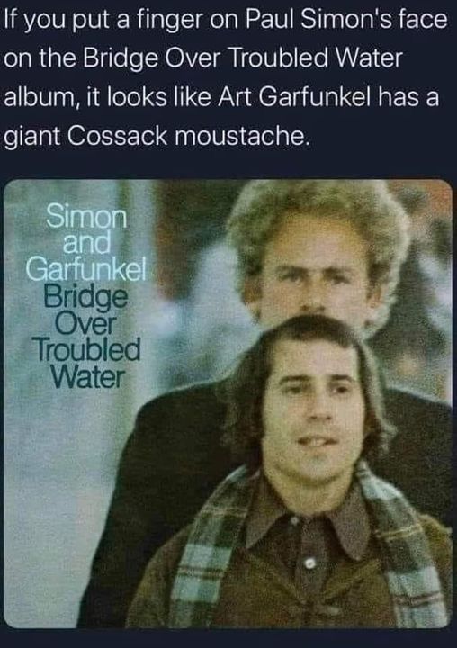 funny memes and cool pics - photo caption - If you put a finger on Paul Simon's face on the Bridge Over Troubled Water album, it looks Art Garfunkel has a giant Cossack moustache. Simon and Garfunkel Bridge Over Troubled Water