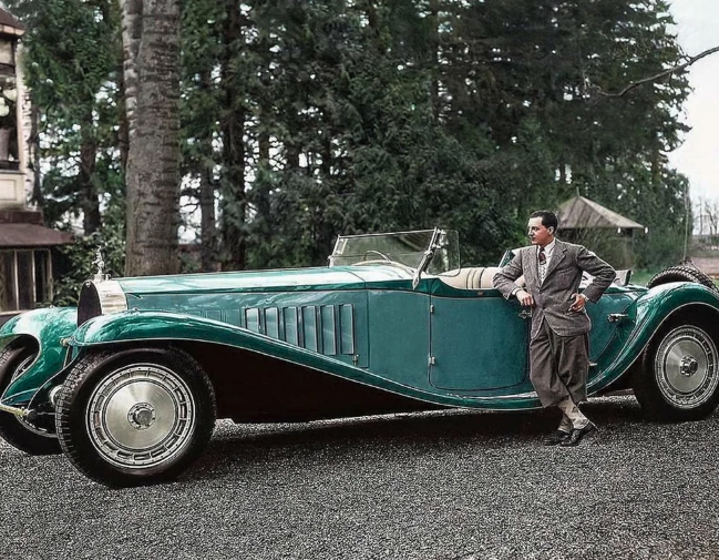 Jean Bugatti standing next to his Bugatti Royale, one of seven built (1932).