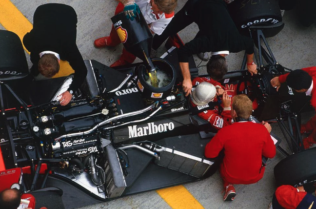 Alain Prost sits in his McLaren-TAG MP4/3 during the 1987 season.