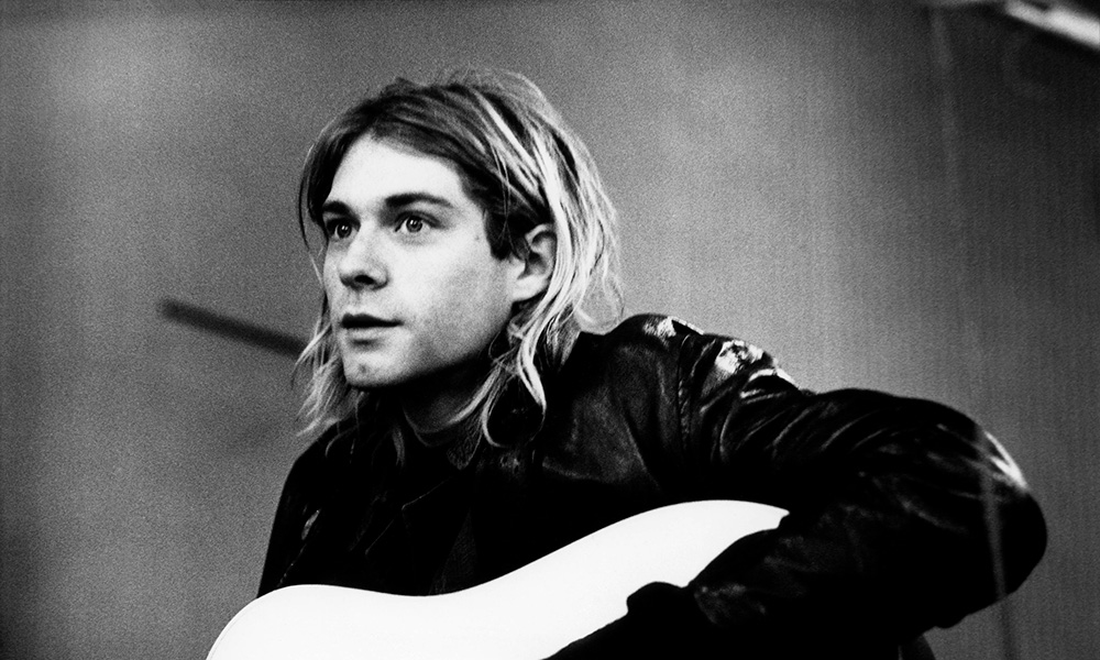 Kurt Cobain. Formed Nirvana in '87, and went from playing record store gigs and dive bars in the late 80's to putting out Nevermind, a record that knocked Michael Jackson out of the #1 spot in Jan of '92. Back then, something like that was unheard of and considered impossible in the industry. For the next couple of years, Nirvana was arguably one of the biggest and most popular rock bands in the world, but Cobain was already thinking of ways to essentially sabotage the band's popularity because he was so uncomfortable with how famous they got while dealing with his own inner demons and drug addiction. 
<br/><br/>
They performed at the Reading Festival in '92 in what many consider one of the great live rock performances of all time. Put out their second major studio album, In Utero in Feb of '93, which went to #1 instantly despite the record company originally thinking it was 'unreleasable' and some major retailers refusing to sell it due to the album art and the song 'R*pe Me'. Performed their iconic MTV Unplugged set in November of '93, despite Cobain being in the heavy throes of heroin addiction and them not knowing if he'd be able to perform until showtime. In March of '94 he intentionally OD'd in Rome while on a European Tour. 
<br/><br/>
Came back home, went to rehab for a couple of days, hopped the fence, and a week later he blew his head off with a shotgun. Nirvana has sold over 75 million records worldwide despite only being a band for less than 7 years, and only releasing essentially 2 major label albums (Nevermind & In Utero), 1 indie album (Bleach), 1 album of b sides (Incesticide), the MTV Unplugged album and a 'greatest hits' album (Nirvana). I'd say that qualifies as a pretty destructive downward spiral, especially considering their ascent was so rapid as well. u/[deleted]