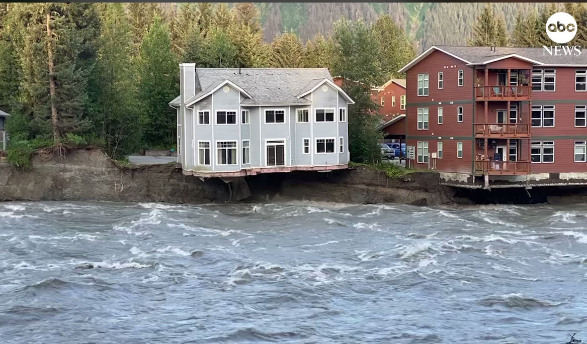 A house <a href="https://www.ebaumsworld.com/articles/watch-a-home-get-swallowed-up-by-raging-waters-in-juneau-alaska/87430219/" target="_blank"><u><b>teeters on the edge of a cliff </u></b></a> after major flooding from Glacier Lake in Juneau, Alaska.