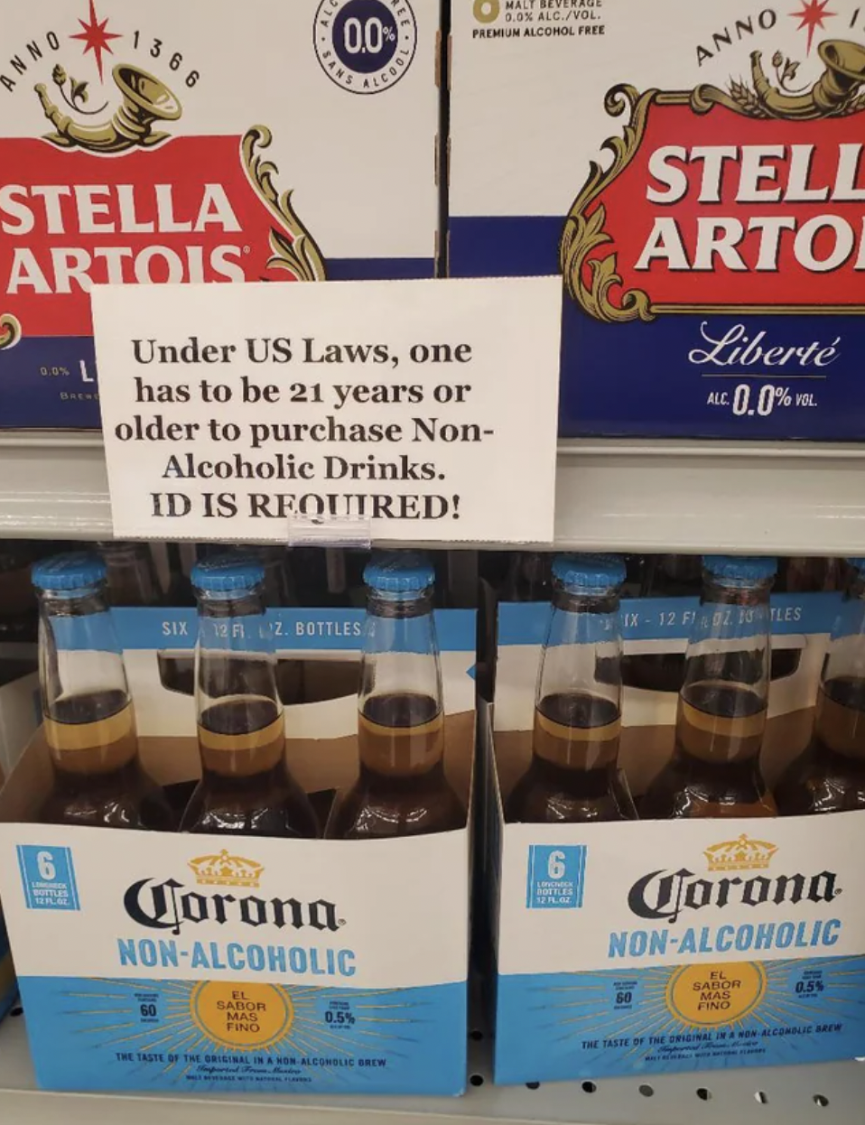 dairy product - Anno. Stella Artois O S 0.0 Under Us Laws, one has to be 21 years or older to purchase Non Alcoholic Drinks. Id Is Required! Sixer Z Bottles Corona NonAlcoholic That The Sallon Fivi Malt Several 3.3% AlcVol. Prin Alcohol Lie Brow 6 Wice An