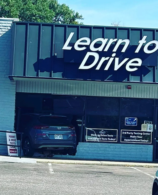 An ironic scene at a driving school.