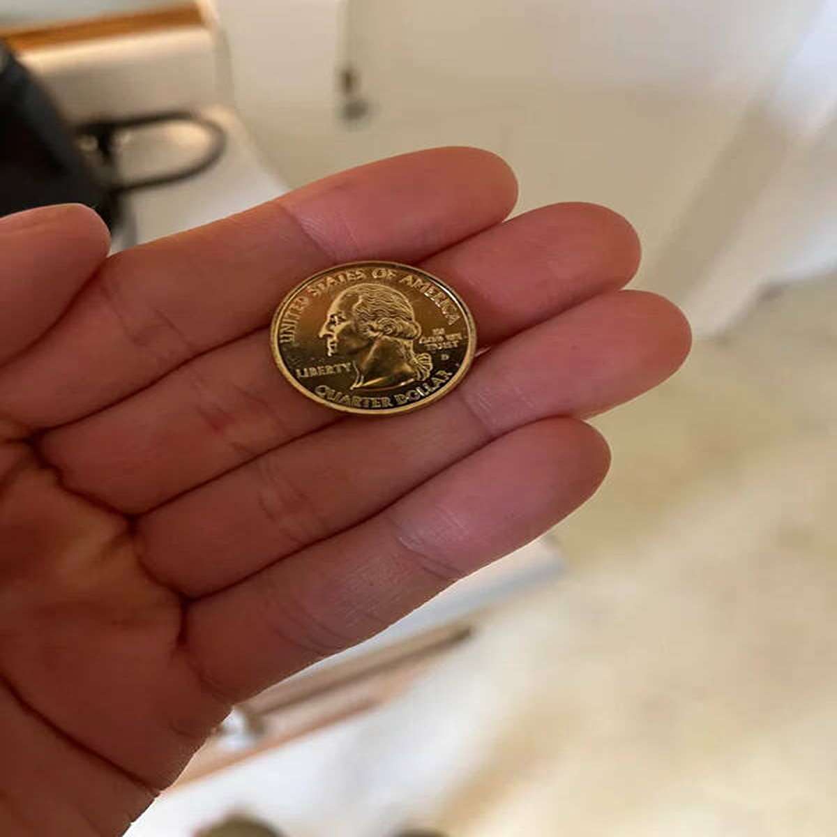 Got a gold quarter in my roll of quarters.