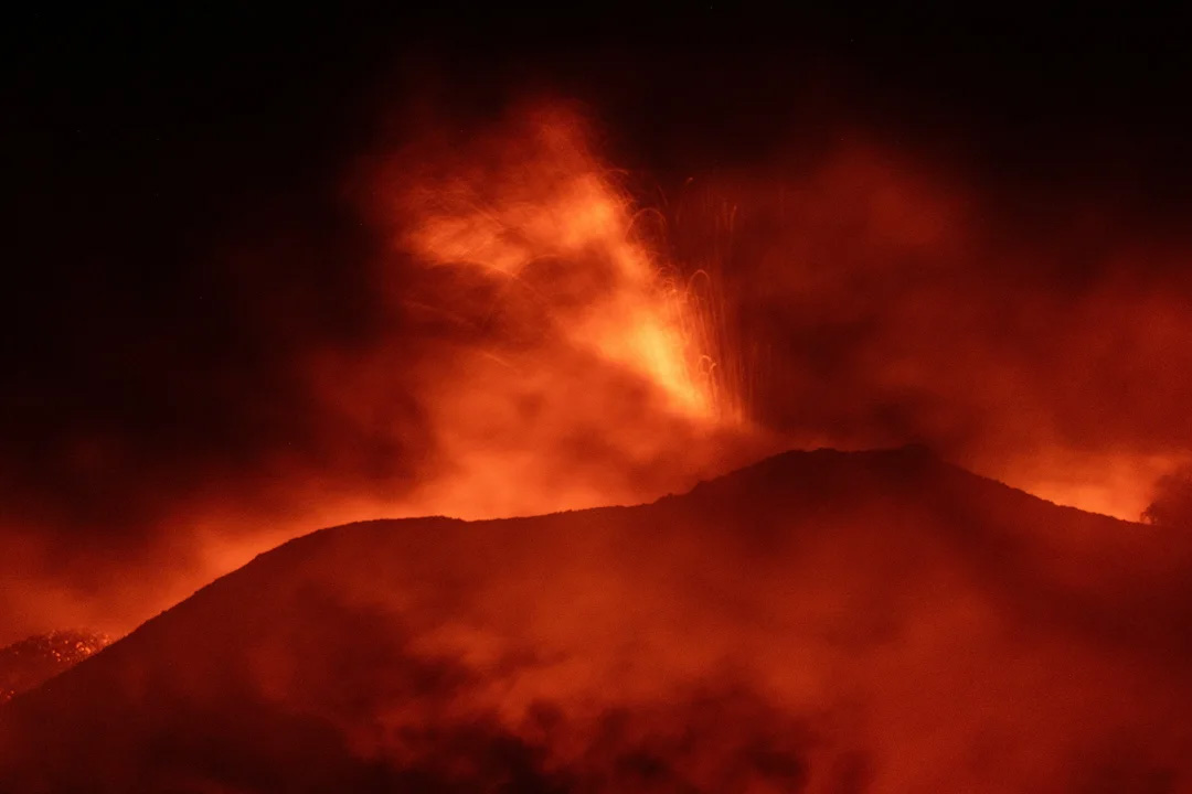 Mount Etna in Sicily, Italy, <a href="https://www.ebaumsworld.com/videos/mount-etna-erupts-in-fiery-blast/87433001/
" target="_blank"><b><u>erupted for the second time</b></u></a> in three months on Sunday night. It appears the volcano, one of the most active in Europe and the world,  it stands at 10,925 ft tall and left a massive cloud of ash, a closed airport, and some apocalyptic footage in its wake.