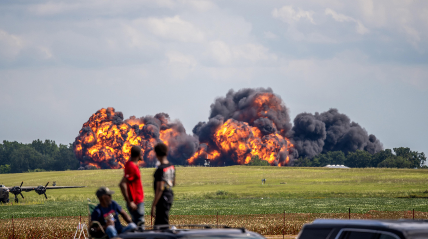 A collection of videos shows the aftermath of a plane crash during an air show in Michigan. Hitting the skies as a part of last weekend’s Thunder Over Michigan air show in Ypsilanti, it’s unclear why the <a href="https://www.ebaumsworld.com/videos/russian-fighter-jet-crashes-into-apartment-building-in-michigan/87433013/" target="_blank"><b><u>MiG-2 crashed</b></u></a>, the Federal Aviation Administration still looking into the accident, per the Detroit Free Press.
<br/><br/>
Though no one was injured in the incident, both the pilot and the passenger parachuting down to Belleville Lake below, the aircraft most definitely was, smashing straight into a car parked at the nearby Waverly on the Lake Apartments.
